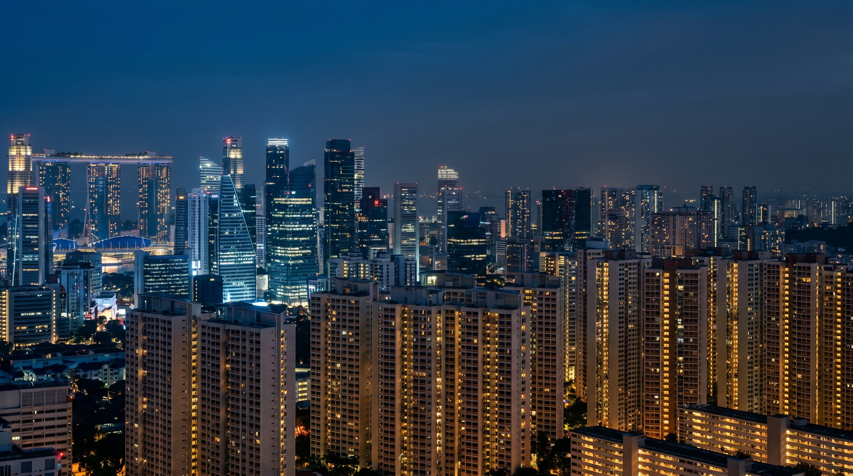 Singapore CBD skyline meeting HDB residential blocks at twilight &mdash; the intersection of property market shifts and financing decisions